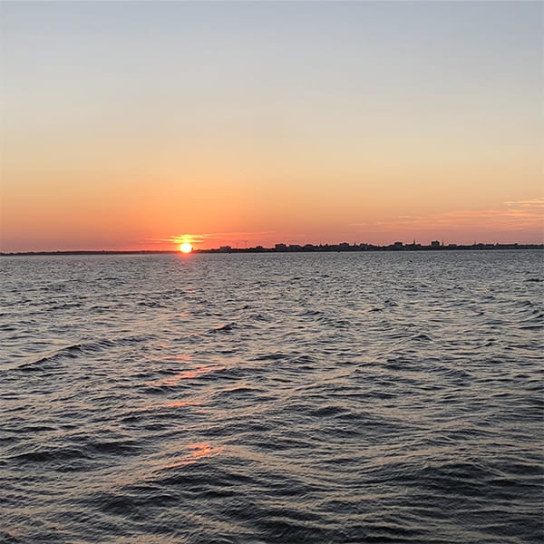 Sun setting on the water. Sunset cruise Charleston, SC