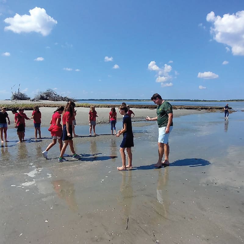 Kids exploring the beach. Nature boat tours Charleston
